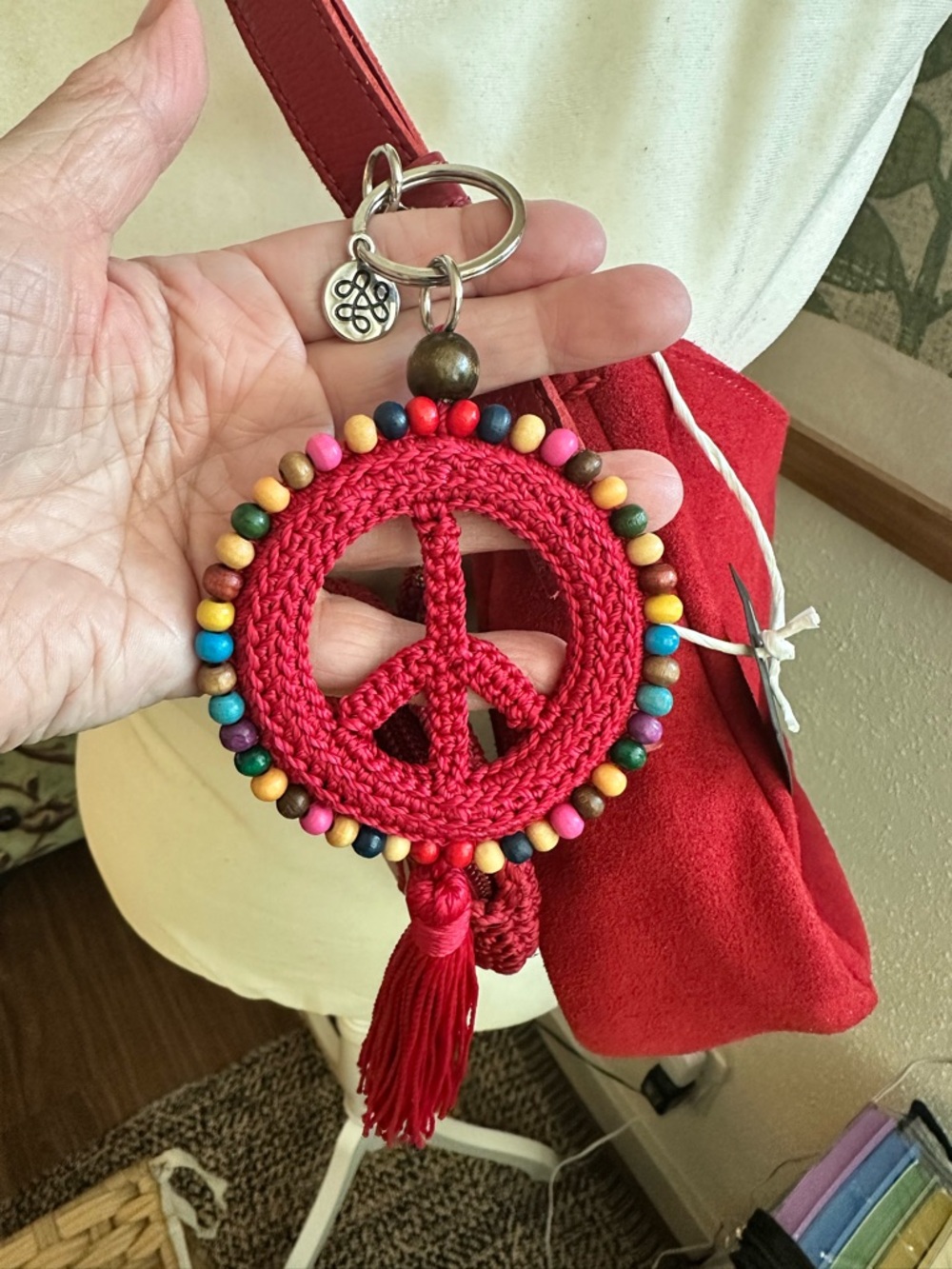 The Sak Tess Sling Bag Red Suede Shoulder Bag with Peace Tassel and Coin Pouch - Picture 4 of 9